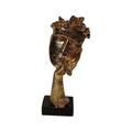 Resin Hand On Face Medium